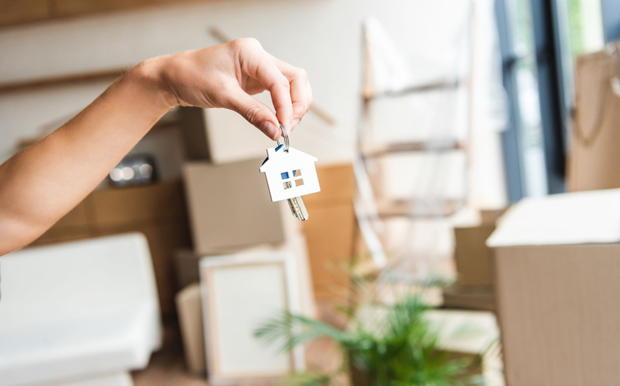 Schlüssel mit Schlüsselanhänger als Haus